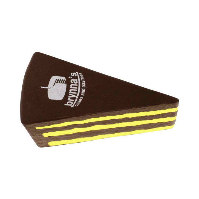 A chocolate cake shaped stress reliever in brown and yellow, featuring a logo on its surface.