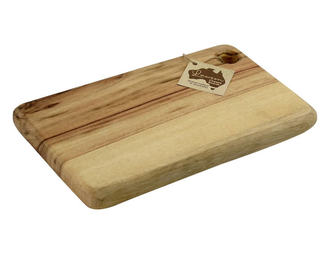 A wooden cheese board in a light brown hue, featuring a handle and an attached tag.