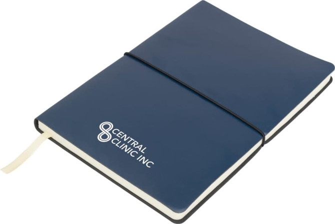 A navy blue Tango A5 notebook with a black elastic band and a logo on the cover.