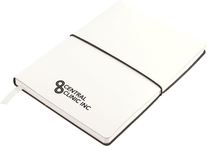 A white Tango A5 notebook with an elastic band, featuring a logo on the cover.