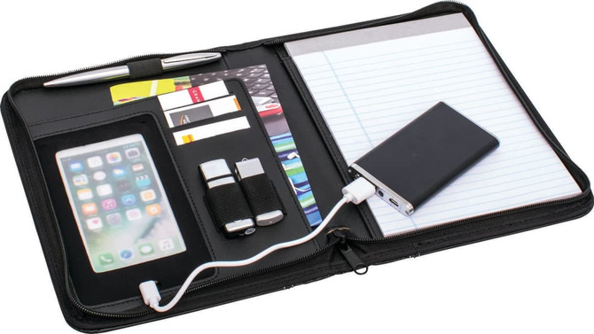 An A5 zip portfolio in black, featuring a notepad, card slots, USB drives, and a power bank with charging cable.