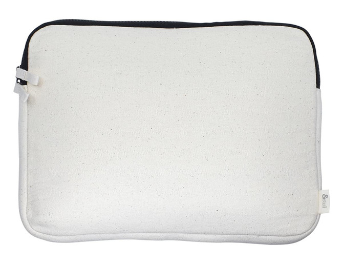 A cream laptop sleeve with a black zipper, featuring a simple design and a branding label.