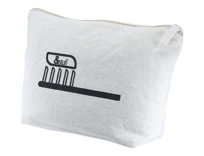 A cream toiletry/makeup bag with a simple graphic design and a zip closure. Features a logo.