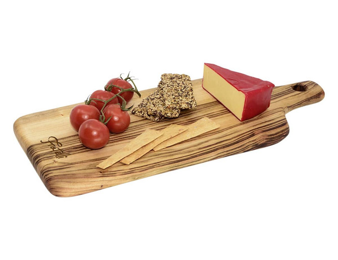 A large wooden serving board with a natural finish, featuring cherry tomatoes, cheese, and crackers.