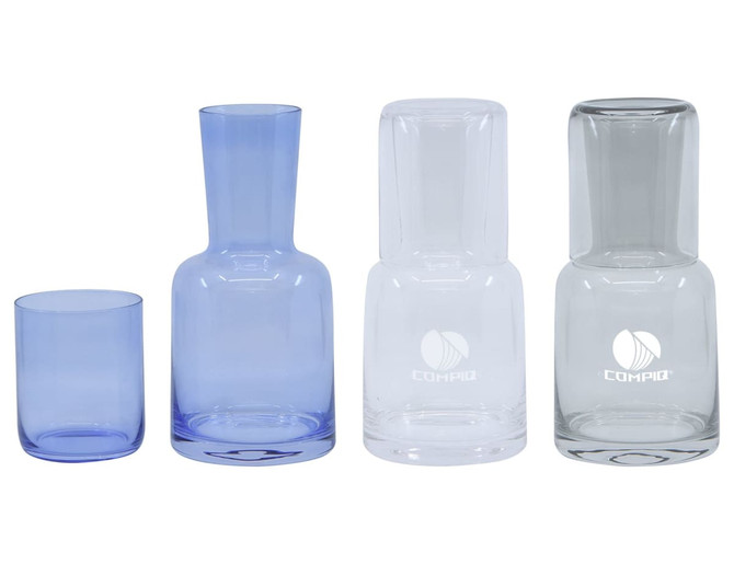 A drink bottle and tumbler set featuring two glass carafes in clear and light blue, alongside matching tumblers.
