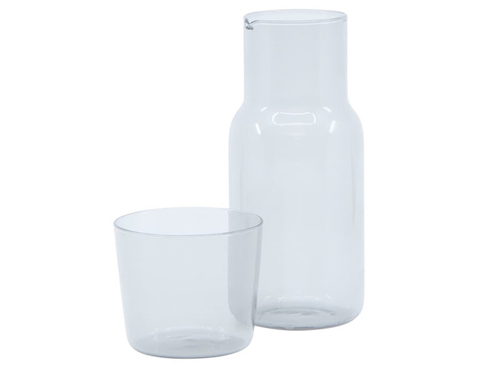 A drink bottle and tumbler set in clear glass, featuring a sleek design with a simple branding logo.