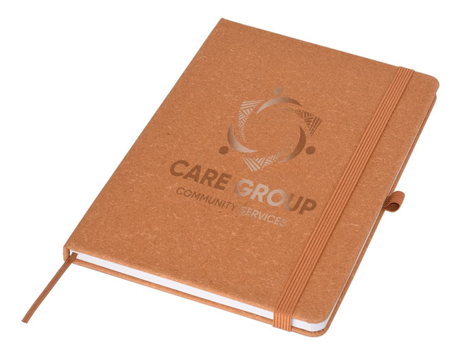 A brown A5 notebook with a textured cover and an elastic band, featuring a logo on the front.