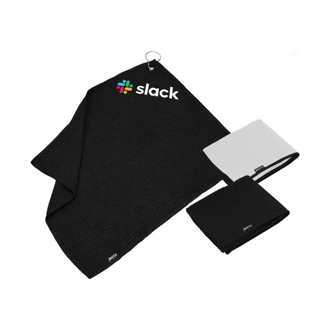 A set of black and white golf towels, featuring a logo, with one towel displaying a textured pattern and a clip.