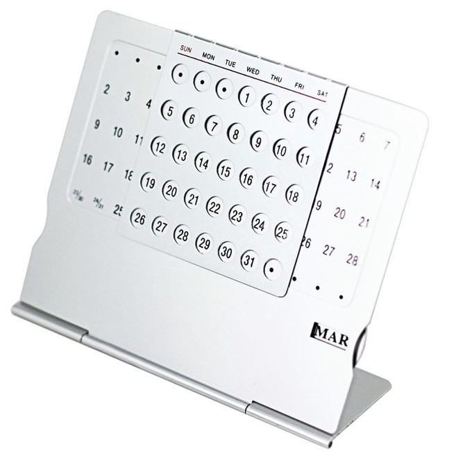 A silver desk calendar featuring a flip design with numbered days and days of the week displayed.