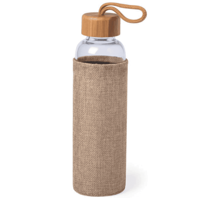 A drink bottle with a clear glass body, a bamboo lid, and a beige fabric sleeve with a loop.