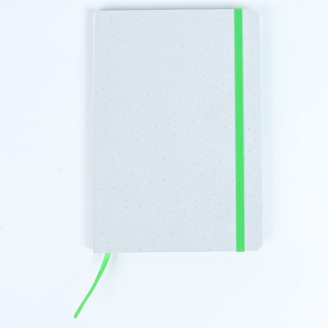 A grey notebook with a dotted texture, featuring a green elastic band and bookmark.