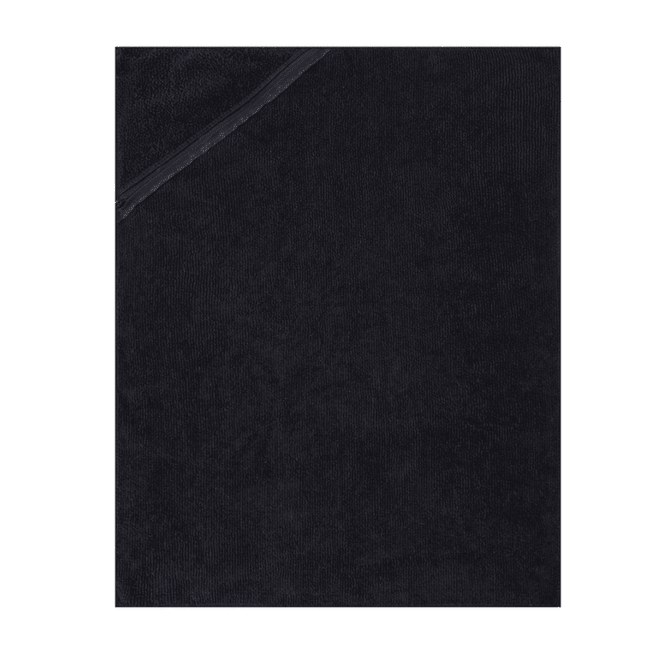 A soft black hand towel featuring a textured surface and a folded corner, with branding present.