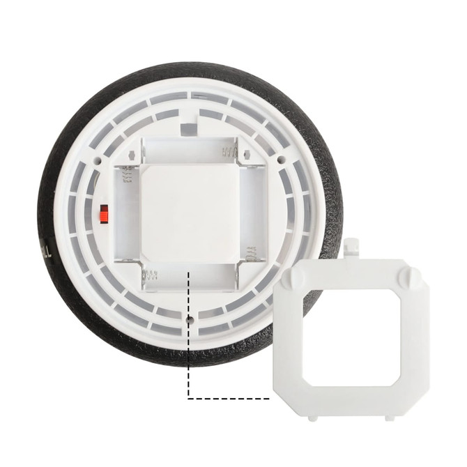 A round black and white Hover Soccer Ball with a removable white connector piece.