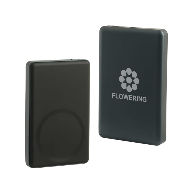A black aluminium power bank with a circular magnetic area, featuring a logo on one side.