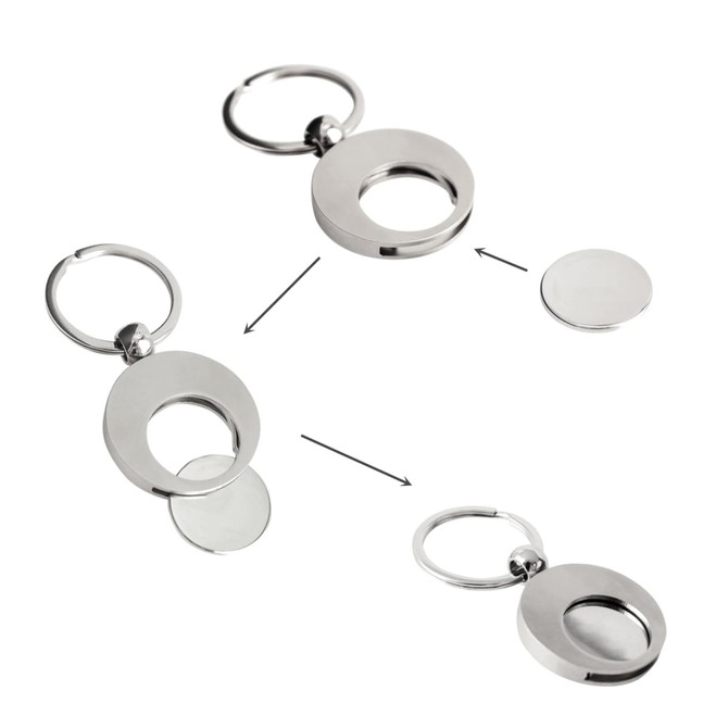 A round silver keyring featuring a detachable coin, designed with a simple, sleek look.
