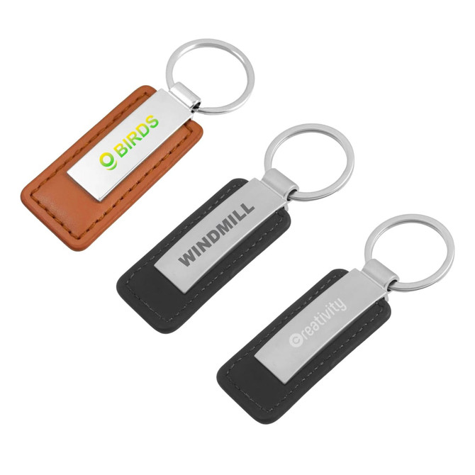 PU leather keyrings in brown and black, featuring a metal attachment and logos on the leather tags.