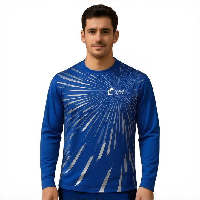 A blue long-sleeved shirt featuring a dynamic pattern and a logo. Made from 100% Poly Milk Silk.