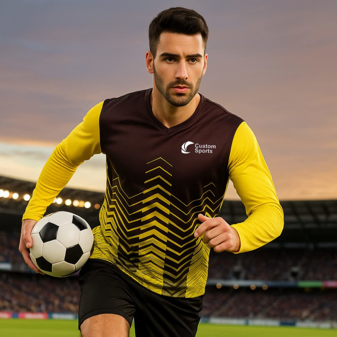 A unisex long-sleeve shirt with a yellow and black design, featuring a logo and a micro mesh fabric.