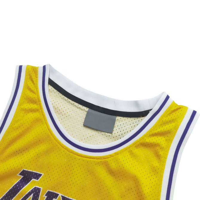 A bright yellow sleeveless sport jersey featuring a white and purple trim, with an interior mesh lining.