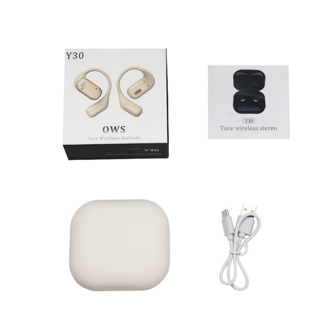 Open-ear headphones in beige packaging, featuring wireless earbuds, a charging case, and a USB charging cable.
