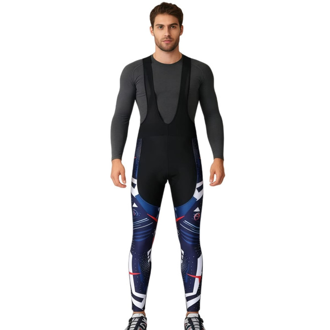 Men's cycling bib tights in navy and black with a subtle patterned design, featuring shoulder straps and a branding logo.