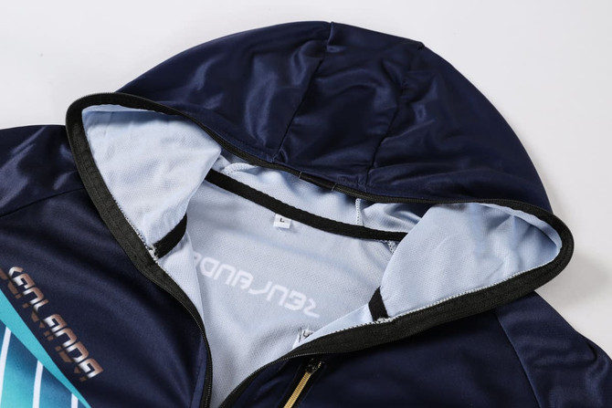 A men's hooded jacket in navy and light blue, made from 100% polyester, featuring a logo on the chest.