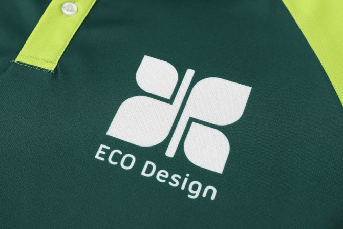 A green and lime unisex polo shirt featuring a logo and a sporty, sublimated design.