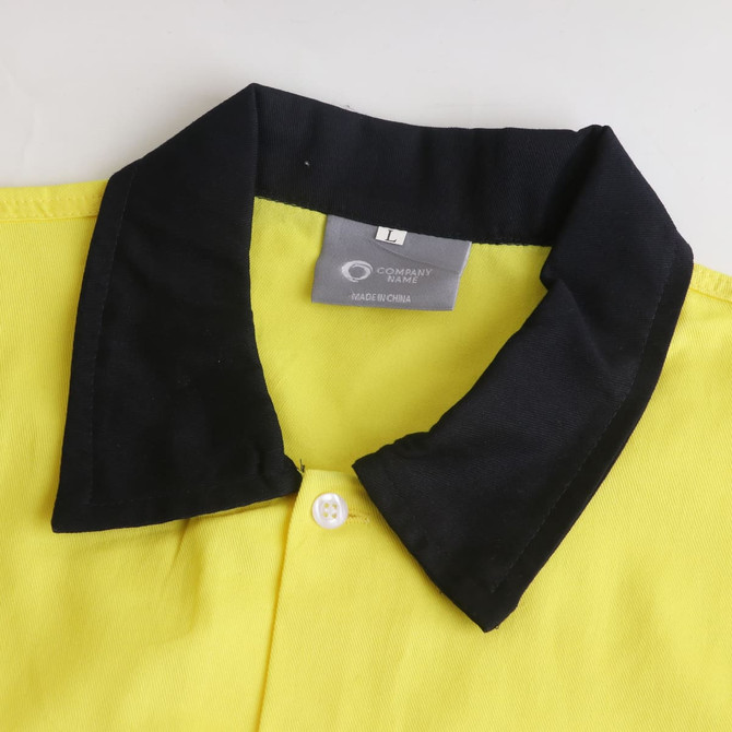 A hi-vis reflective long sleeve shirt in yellow with a black collar and a branded label.