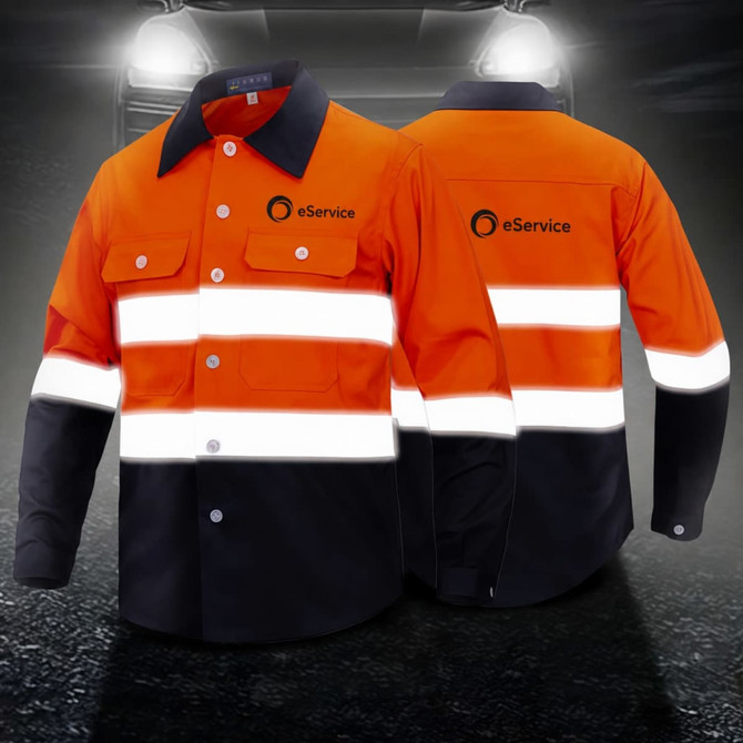 A unisex long-sleeved shirt in orange and black, featuring reflective stripes and a logo.