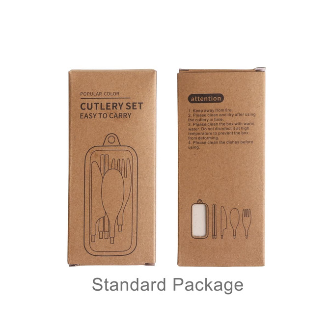 A cutlery set in a cardboard package, featuring utensils in light and dark tones. The package includes a logo.