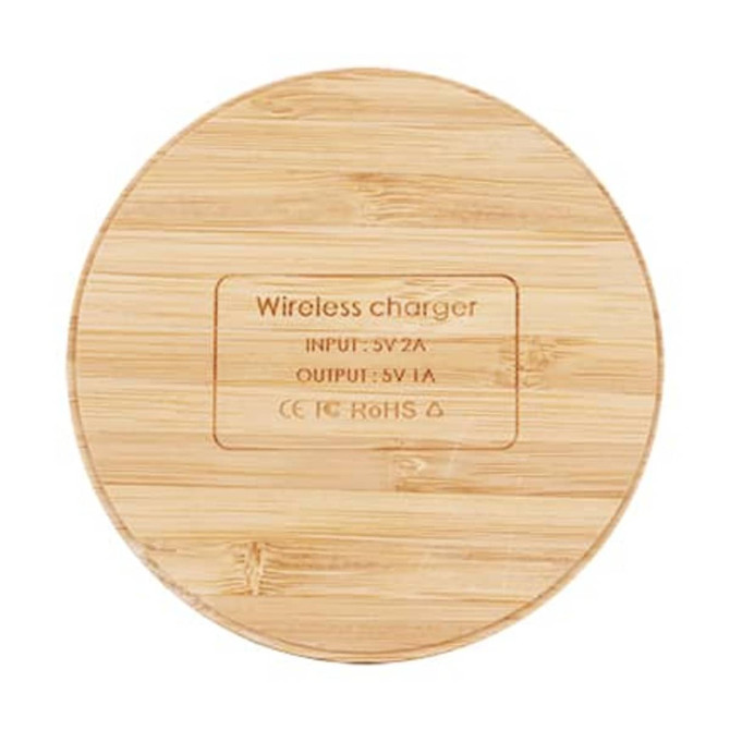 A round bamboo wireless charger with a smooth surface and a logo on it, featuring natural wood tones.