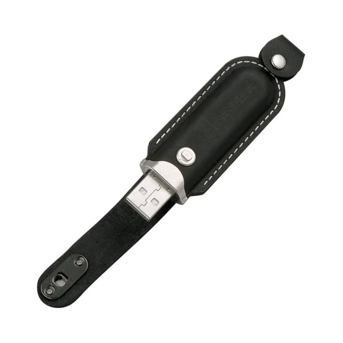 A black leather flash drive with a metal connector, featuring a snap closure and a logo on the leather.