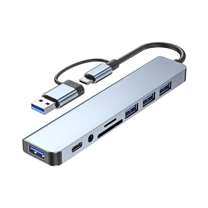 A silver USB hub featuring dual input, Type-C and Type-A ports, with multiple USB connections and an SD card slot.