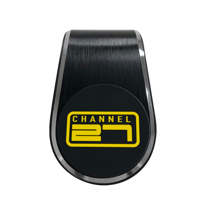 A sleek black and silver magnetic car phone holder with a circular centre featuring a logo.