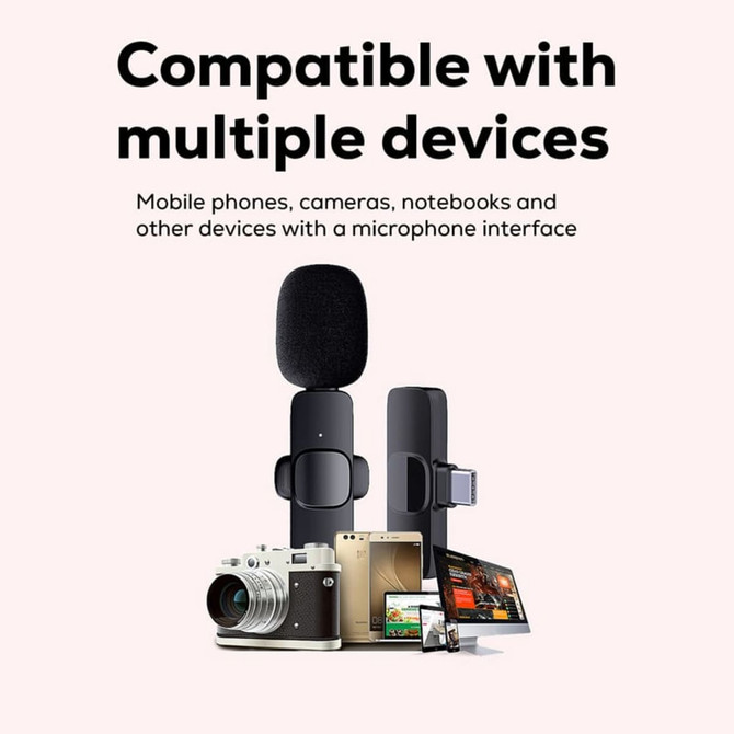 A wireless microphone in black, designed for compatibility with multiple devices like phones and cameras, featuring a sleek design.