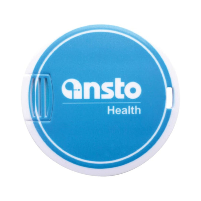 A round blue flash drive with a white casing and a logo. It has a simple, compact design.