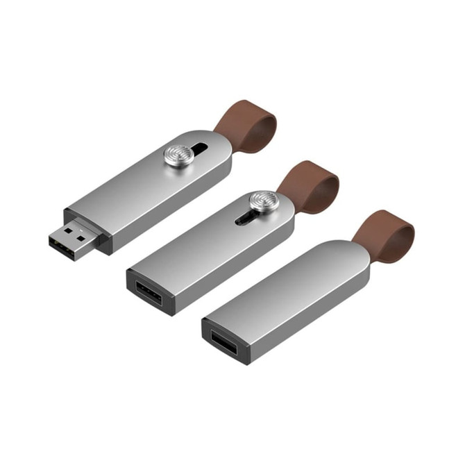 A silver flash drive with a brown attachment, featuring a USB connector and a sliding mechanism.