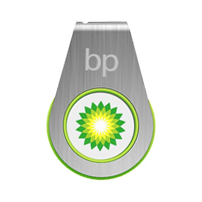 A silver and green flash drive with a circular design and a logo featuring a yellow and green pattern.
