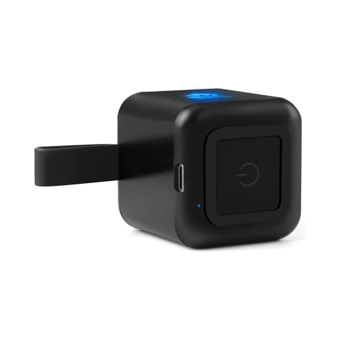 A compact black cube speaker with a power button, USB port, and a hanging strap. It has a glowing blue light on top.
