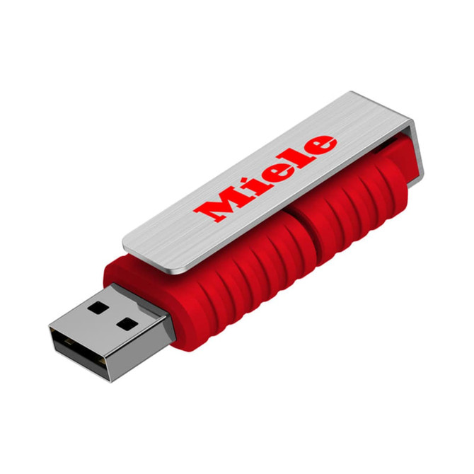 A red USB flash drive with a silver casing and a logo on the side.