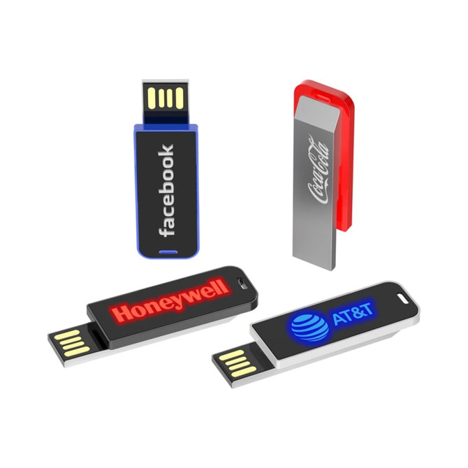 A collection of four USB flash drives in various colours, featuring logos from Facebook, Honeywell, AT&T, and Coca-Cola.