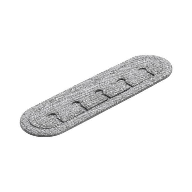 A grey cable organiser made from RPET, featuring multiple slots for neatly tidying cables. It has a logo on the surface.