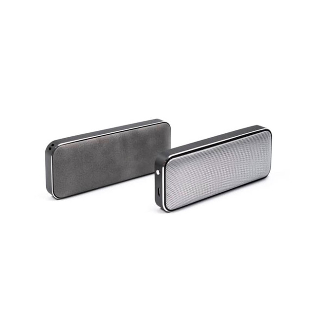 A pair of rectangular Bluetooth speakers in black and silver, featuring a textured finish and a logo.
