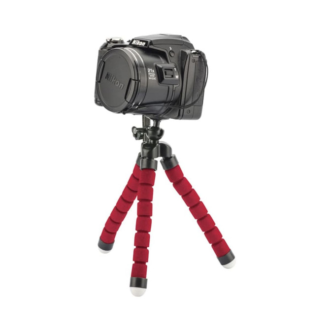 A red and black Flex Tripod with a camera mounted on top, featuring flexible legs and rubber feet.