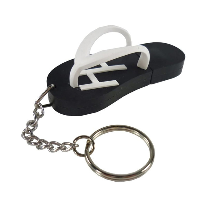 A custom moulded flash drive shaped like a black flip-flop with a white thong and attached keychain.