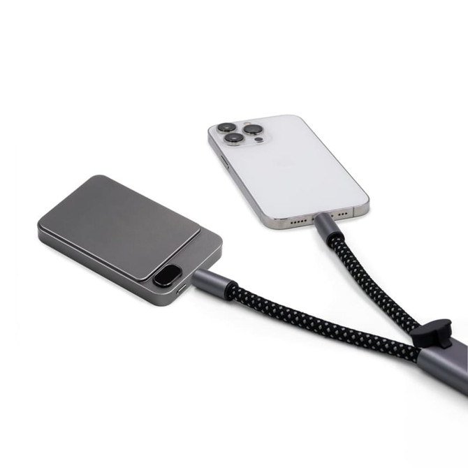 A grey eco-friendly phone strap with a connecting charging cable attached to a smartphone.
