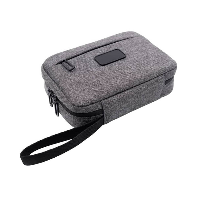 A grey toiletry bag with a zip closure and a convenient handle, featuring a sleek design.