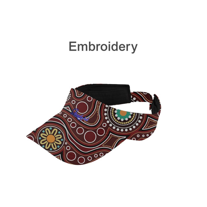 A full sublimation visor in maroon, featuring a vibrant abstract pattern and a logo on the side.