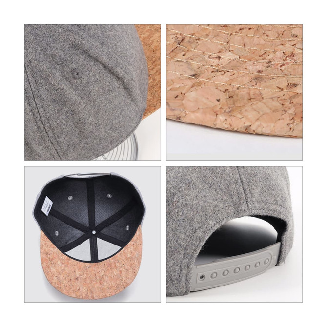 A flat snapback cap with a grey fabric top and a cork brim. Features an interior view with a branding logo.