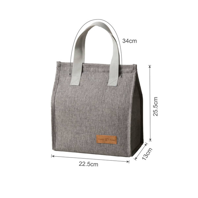 A grey minimalist lunch bag with white straps, featuring a logo and measuring 34cm in height and 22.5cm in width.